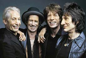 Rolling Stones (Jagger third from left)rolls on