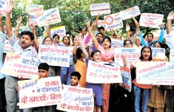 Members of the Surbhi Pariwar Foundation hold a demonstration to demand the moving of the two-child Bill in Parliament on the occasion of 
