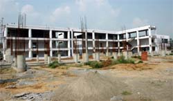 The under-construction building of the school. 