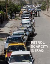 Motorists in central Baghdad queue for petrol on Wednesday. Motorists sometimes queue for half a day to get petrol. The fact that Iraq has the world's third largest oil reserves adds to their frustration.