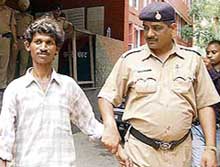 Shyam Sunder in police custody at Mani Majra in Chandigarh on Thursday.