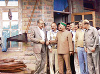 Chief Minister Virbhadra Singh inspects work to restore the historic Gaiety theatre in Shimla on Thursday.