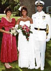 flanked by sister Dina and brother Jay, at her wedding