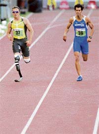South Africas Oscar Pistorius (left) competes with Italys Marco Moraglio in the mens 400m B race during the IAAF Golden Gala in Romes Olympic Stadium