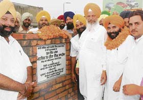 Minister for jails, cultural affairs and tourism Hira Singh Gabria lays the foundation stone of a community centre at Bhai Randhir Singh Nagar, Block-J, Ludhiana