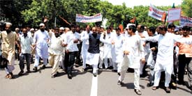Members of the Bharatiya Janata Party (BJP), Minority Cell, protest against the UPA Government's minority policy in the Capital on Monday.