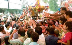 Devotees at the annual Lord Jagannath Rath Yatra in Ludhiana on Monday.