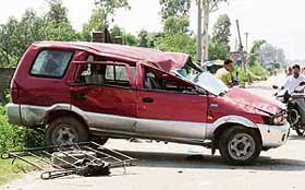 The mangled remains of the ill-fated vehicle which overturned on the national highway in Jalandhar on Monday.
