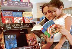 A mother reads from Harry Potter to her child, at a bookstore in Chandigarh.