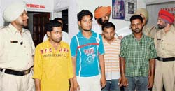 Three of the four alleged car thieves in police custody in Ludhiana on Tuesday.