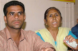 Family members of arrested man address mediapersons in Jalandhar on Wednesday.