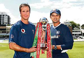 England's Michael Vaughan (left) holds the NPower trophy with India's captain Rahul Dravid at Lords cricket ground in London on Wednesday.