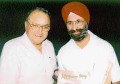 Nanda presents his autobiography to Punjab Governor Gen S.F.Rodrigues in Chandigarh