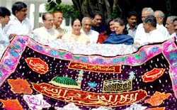 Congress president Sonia Gandhi with party leaders sending a chaddar as an offering to the shrine of Hazarat Khwaja Moinuddin Chisthi in Ajmer during the annual Urs, at her residence in the Capital
