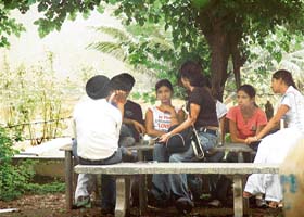 As the new academic session begins, these students find time to relax under a tree at a college in Ludhiana