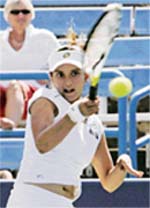 Sania Mirza hits a volley during her quarterfinals match against Olga Govortsova of Belarus at the Western & Southern Financial Group Womens Open in Mason, Ohio (USA)