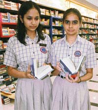 Surbhi & Apeksha picked up the book before dashing off to school!