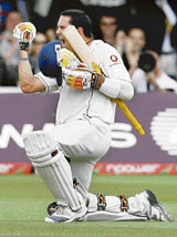 Kevin Pietersen celebrates scoring a century during the fourth day of the first Test cricket match on Sunday.