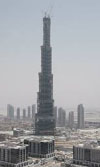 The worlds tallest tower Burj Dubai stands on Sheikh Zayed Road in Dubai.