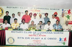 Dr Vijay Obed (fifth from right), who was elected as rotary president, with other office-bearers after the installation ceremony in Ludhiana