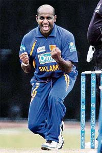 Sri Lankas Sanath Jayasuriya celebrates the dismissal of Bangladeshs Syed Rasel during the second one-dayer at the R. Premadasa Stadium in Colombo