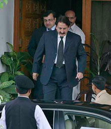 Pakistans Chief Justice Iftikhar Chaudhry leaves his official residence in Islamabad on Monday as he heads to the Supreme Court for the first time after he was reinstated.  Reuters