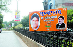 A hoarding displays image of state president Rajender Bhandari near Circuit House in Jalandhar.