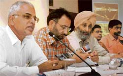 V.S. Kundu, director IT Haryana, speaks as (from left) S.K. Sandhu, secretary IT, Chandigarh, A.P.S Kairon, Minister for IT, Punjab, R.K. Verma, director IT, Punjab, Dr Sanjay Tyagi, additional director, STPI, Mohali, look on at a press conference in Chandigarh