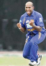 Senath Jayasuriya celebrates after taking a wicket in Colombo.