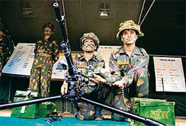 Jawans of the 14th Battalion, Jammu and Kashmir Rifles, enact battle scenes during Kargil Divas celebrations in Jutog, near Shimla, on Thursday.