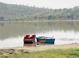 Boats lie idle on the bank of Bara Taal in the Morni hills.