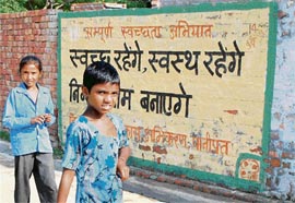 Slogans on cleanliness painted on a wall in Bilaspur village, which has been awarded for its high standard of cleanliness.