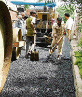 Recarpeting of a road in progress in the Haibowal area of Ludhiana