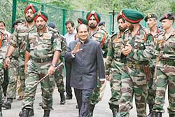 Defence minister A.K Antony and Army Chief Gen J.J. Singh arrives at Kamaan Aman Setu on the LoC at Uri in Jammu and Kashmir