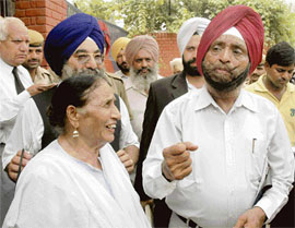 Overjoyed parents of Navjot Singh, Tarlok Singh Chabbra and Santosh Kaur.