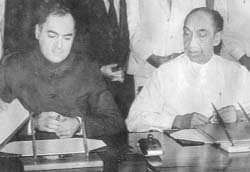 File photo showing Prime Minister Rajiv Gandhi and Sri Lankan President J.R. Jayewardene signing an agreement in Colombo on July 29, 1987, to establish peace and normalcy in Sri Lanka