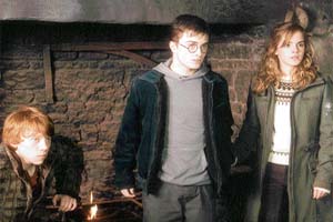 Rupert Grant, Daniel Radcliffe and Emma Watson in Harry Potter and the Order of the Phoenix