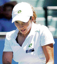 Yes, I am tired: Sania Mirza returns a shot to Anna Chakvetadze during the final of the Bank of the West Classic tennis tournament. Sania later said she was mentally and physically tired.