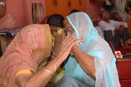 A few village women huddled together after the TADA court sentenced Sanjay Dutt to six-year rigorous imprisonment.