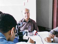Former Chief Minister and All-India BJP vice-president Shanta Kumar addresses a press conference at Palampur on Tuesday.