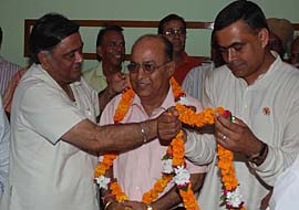 Local bodies minister Manoranjan Kalia welcomes former Congress councillor Vijay K Kumar into party fold.
