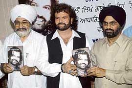 Sufi singer Hans Raj Hans at the release of his book in Jalandhar on Wednesday.