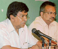 Haryana BJP vice-president Gian Chand Gupta (left) addresses a press conference in Chandigarh on Thursday to demand an inquiry into the involvement of a VIP in a ruckus in Panchkula.