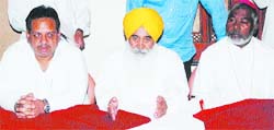 SAD election coordinator Seva Singh Sekhon and Freddy Joseph, convener of the Punjab Christian Intellectual Forum, address a press conference in Jalandhar