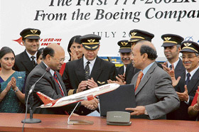 Air Indias chief V. Thulasidas (right) and Vice-President, Sales, Boeing Commercial Airplanes, Dinesh Keskar, at the signing ceremony