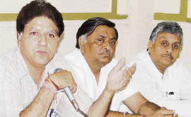 State BJP president Rajinder Bhandari addresses mediapersons in Ludhiana