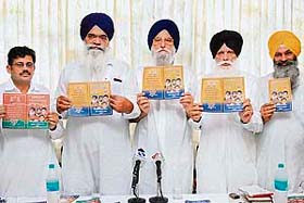 BJP and SAD leaders release the manifesto for MC poll in Amritsar