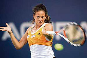 Switzerlands Patty Schnyder plays a return to Russias Elena Dementieva during the semifinal of Acura Classic tournament in Carlsbad, California, on Saturday. Schnyder won 7-6, 6-0.