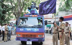 Delhi Police Commissioner Y.S. Dadwal flags off a disaster management vehicle in the Capital