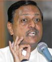 Satpal Jain stresses a point at a press conference in Shimla 